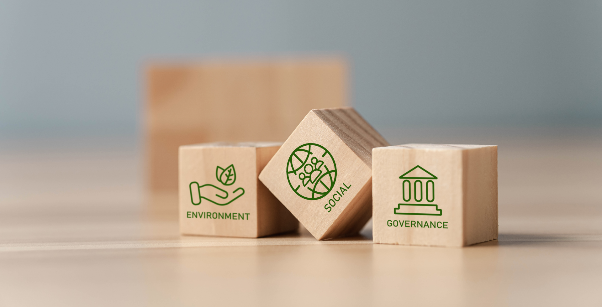 Three wooden blocks with the words Environmental, Social, Governance