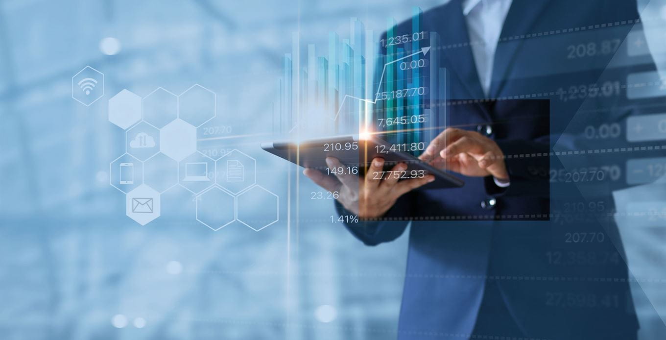 Businessman controls data with tablet